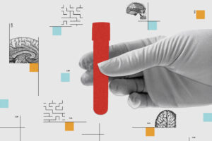 Gloved hand holds test tube