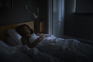Woman sleeping in bed