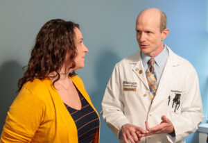 Trial participant Rachel Habiger meets in 2018 with Randall J. Bateman, MD, the director of the Dominantly Inherited Alzheimer Network Trials Unit (DIAN-TU) at Washington University School of Medicine in St. Louis. The DIAN-TU has announced that it will be targeting two key Alzheimer’s proteins — amyloid and tau — as part of its Tau Next Generation Alzheimer’s prevention trial.