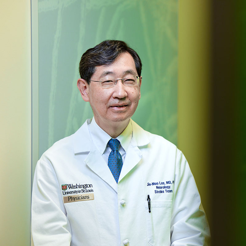 Jin-Moo Lee, MD, PhD, is the new head of neurology. He was photographed next to his image of amyloid outside of his lab in the Institute of Health on June 14, 2021. MATT MILLER/WASHINGTON UNIVERSITY SCHOOL OF MEDICINE