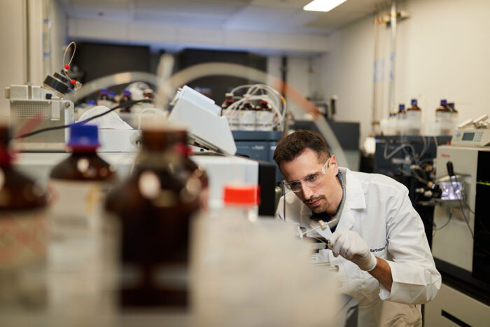 Nicolas Barthélemy, PhD, an assistant professor of neurology at Washington University School of Medicine in St. Louis, loads a sample into a mass spectrometer. Barthélemy uses mass spectrometry as part of his work at the university’s new Tracy Family SILQ Center for Neurodegenerative Biology. The center was established to help researchers discover, study and validate biomarkers of neurodegenerative diseases such as Alzheimer’s and Parkinson’s, with a goal of identifying new drug targets and creating better diagnostic and prognostic tests.